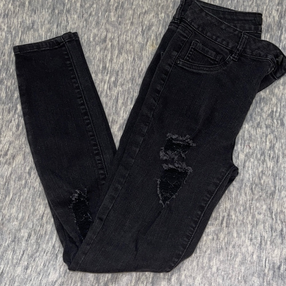 Ripped black skinny jeans